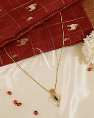 Antique Gold Framed Nagapadam Pendant Necklace with Ruby Accents