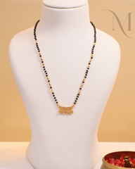 Short Mangalsutra with gold and AD stones pendant