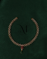 Double Row CZ Necklace with Ruby-Petal Motif and Emerald Drop