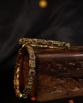 Temple-Inspired Ruby Gold Bangles