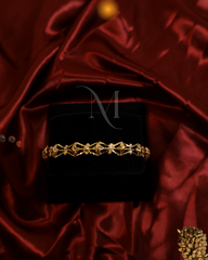 Elegant Floral-Inspired Gold Bangle