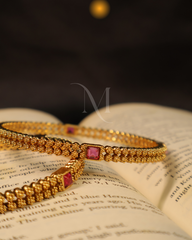 Timeless Bloom – Floral Gold Bangles with Ruby Accents