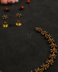 Elegant Floral Diamond Necklace with Matching Stud Earrings