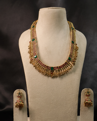 Traditional Kemp Stone Necklace with Green Accents and Jhumka Earrings