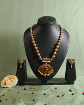 Antique Gold Bead Mala with Ruby-Studded Pendant and Matching Earrings