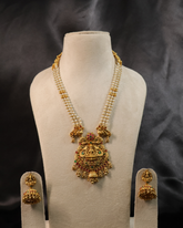 Temple Design Pearl Mala with Goddess Lakshmi Pendant and Jhumka Earrings