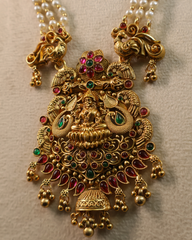 Temple Design Pearl Mala with Goddess Lakshmi Pendant and Jhumka Earrings
