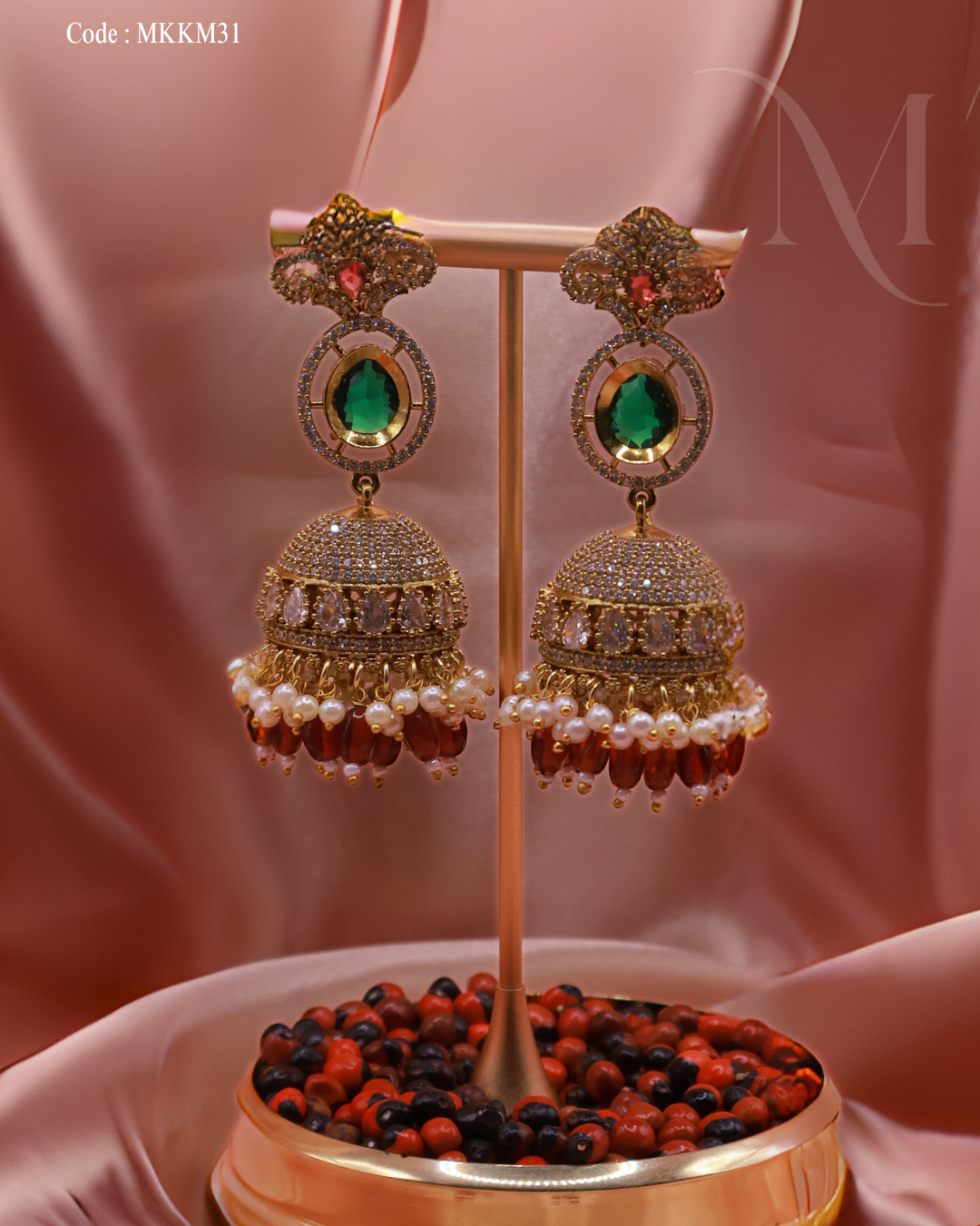 Elegant Kundan and Pearl Jhumka Earrings with Green and Ruby Accents