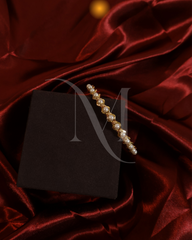 Classic Pearl-Studded Gold Bangle