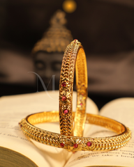 Divine Radiance – Antique Gold Bangles with Ruby Highlights