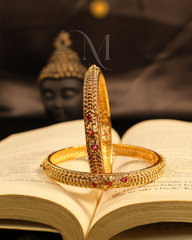Divine Radiance – Antique Gold Bangles with Ruby Highlights