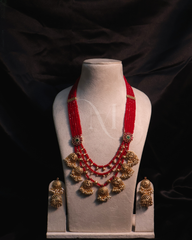 Traditional Red Bead Necklace Set with Golden Jhumka Accents