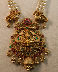 Temple Design Pearl Mala with Goddess Lakshmi Pendant and Jhumka Earrings